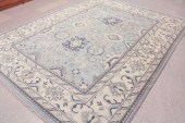A CONTEMPORARY HAND KNOTTED OR