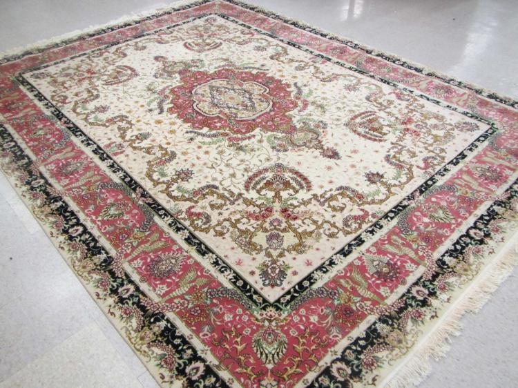 A CONTEMPORARY HAND KNOTTED PERSIAN
