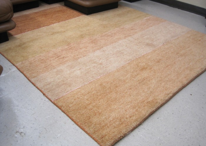 A CONTEMPORARY HAND KNOTTED WOOL