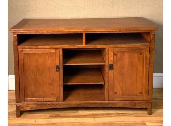 A contemporary oak veneered Arts