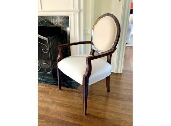 A contemporary open armchair with a