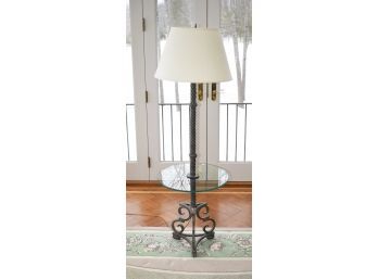 A contemporary steel floor lamp