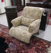 A CONTEMPORARY UPHOLSTERED LOU