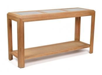 A contemporary wood sofa table, the