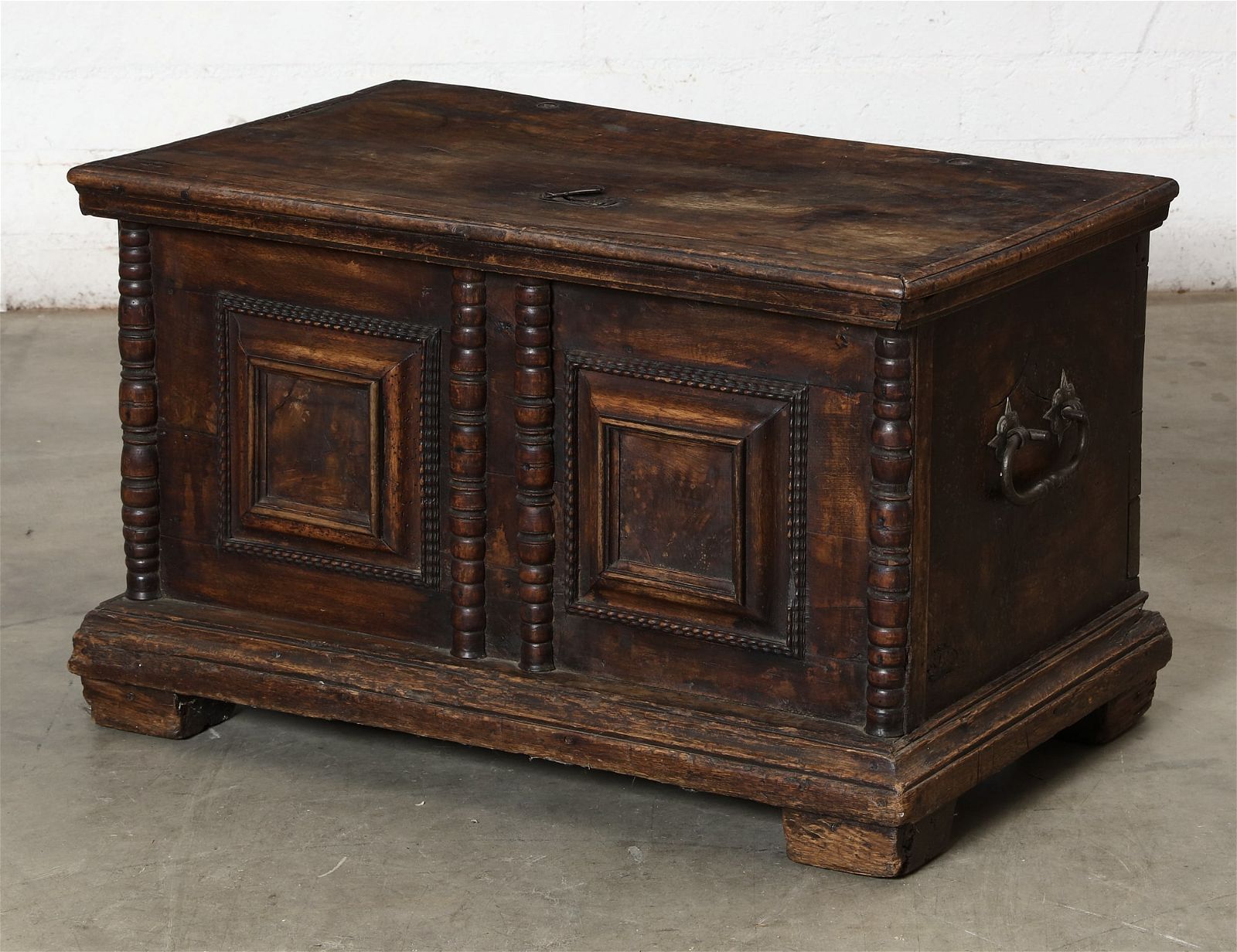 A CONTINENTAL BAROQUE WALNUT