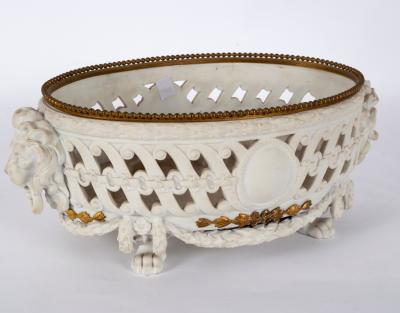 A Continental biscuit porcelain and