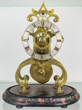 A CONTINENTAL BRASS SKELETON C