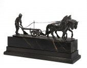 A CONTINENTAL BRONZE FIGURAL G