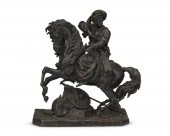 A CONTINENTAL BRONZE FIGURE ON