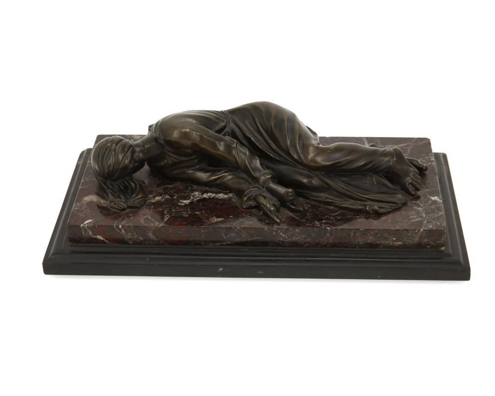 A CONTINENTAL BRONZE SCULPTURE OF A