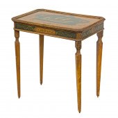 A CONTINENTAL CARVED AND PAINT