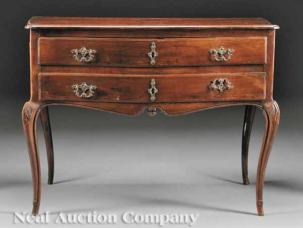 A Continental Carved Fruitwood