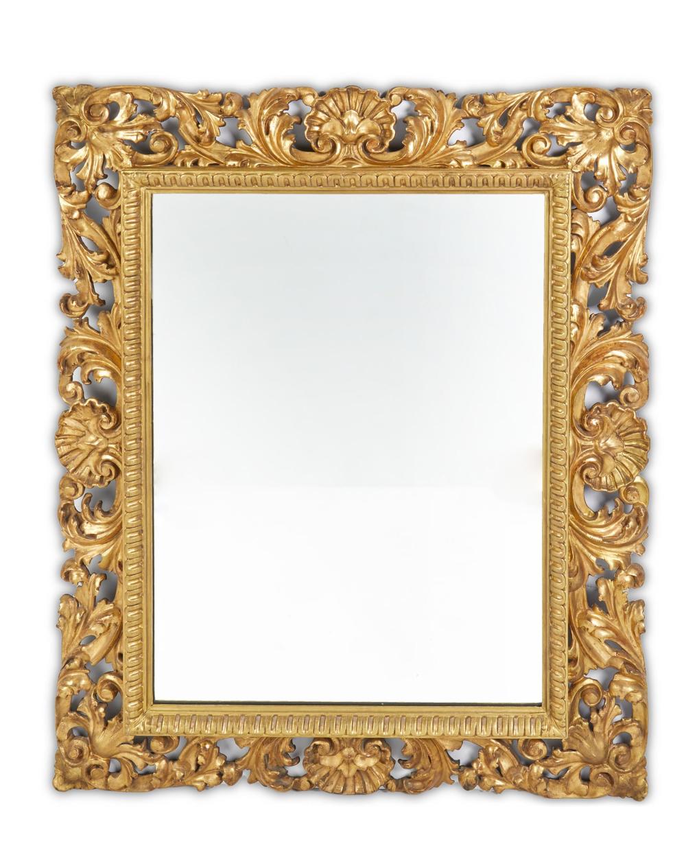 A CONTINENTAL CARVED GILTWOOD