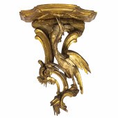 A CONTINENTAL CARVED GILTWOOD
