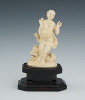 A Continental Carved Ivory Aph