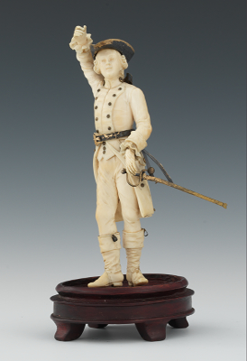 A Continental Carved Ivory Figurine