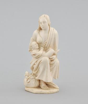 A Continental Carved Ivory Figurine