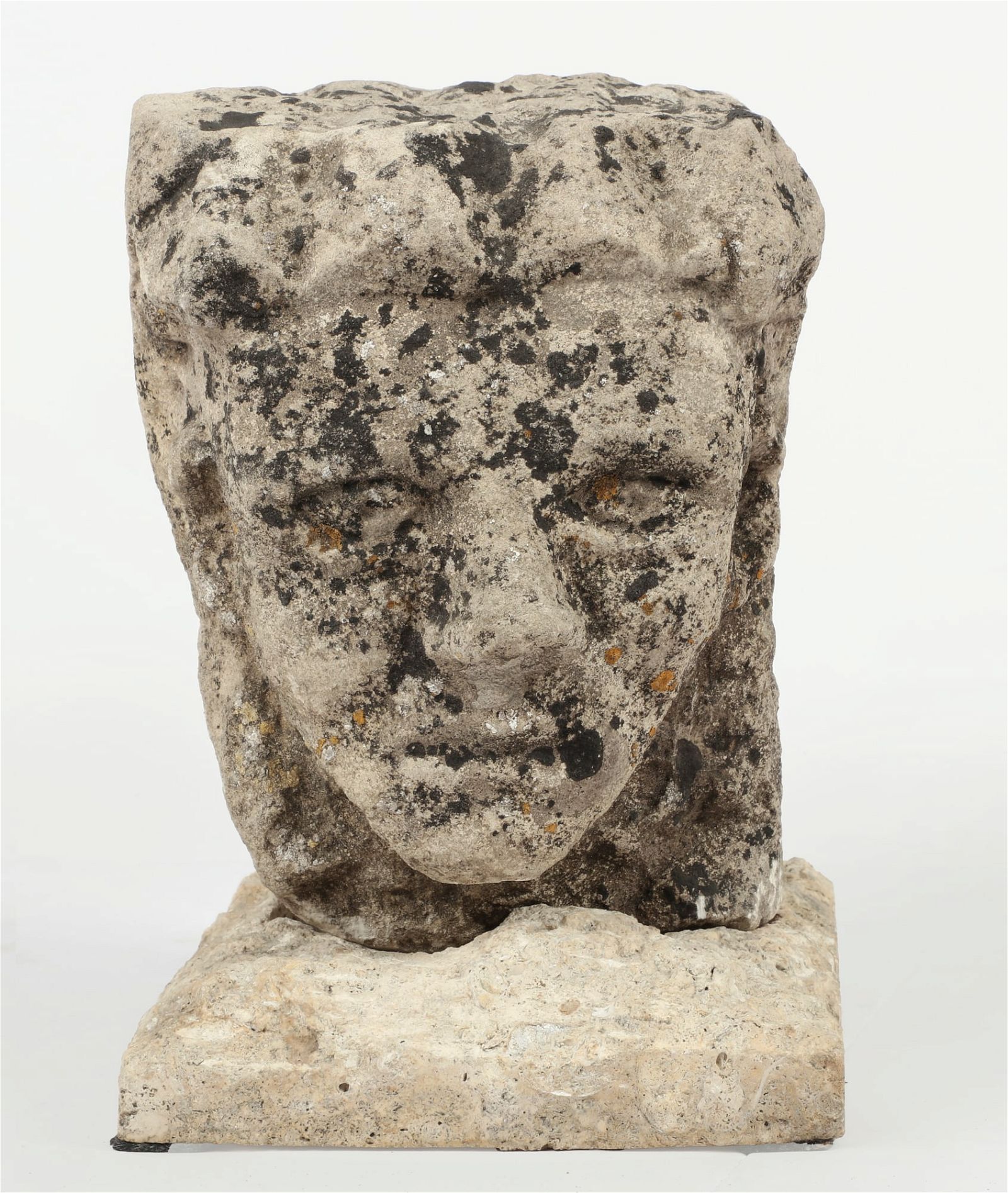 A CONTINENTAL CARVED LIMESTONE