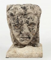 A CONTINENTAL CARVED LIMESTONE
