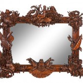 A Continental Carved Mahogany