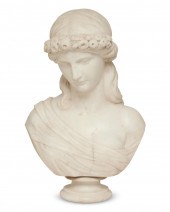 A CONTINENTAL CARVED MARBLE BU