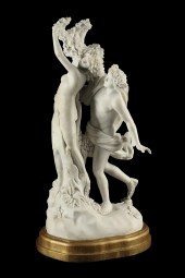A CONTINENTAL CARVED MARBLE FI