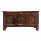 A CONTINENTAL CARVED OAK COFFE