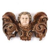 A CONTINENTAL CARVED PUTTO WAL