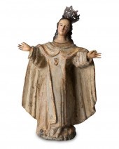 A CONTINENTAL CARVED WOOD FIGU