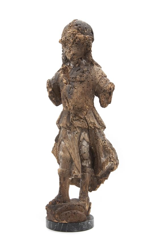 A Continental Carved Wood Santos