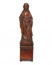 A CONTINENTAL CARVED WOOD SCUL