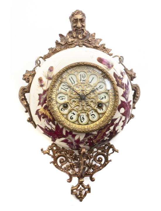 * A Continental Ceramic and Gilt