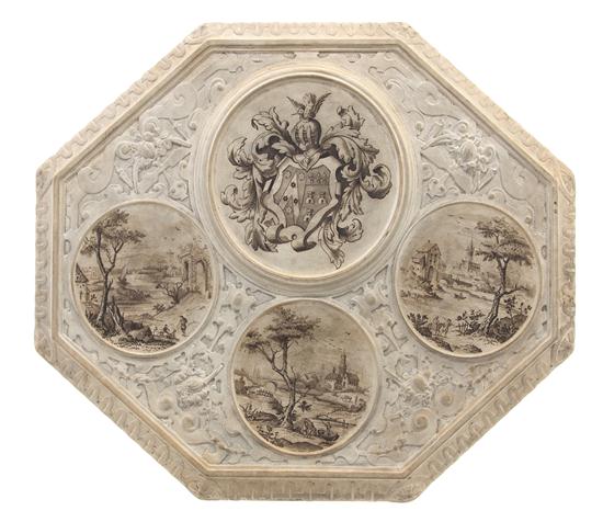 * A Continental Ceramic Trivet of