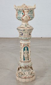 A CONTINENTAL EARTHENWARE JARD
