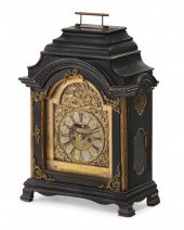 A CONTINENTAL EBONIZED BRACKET