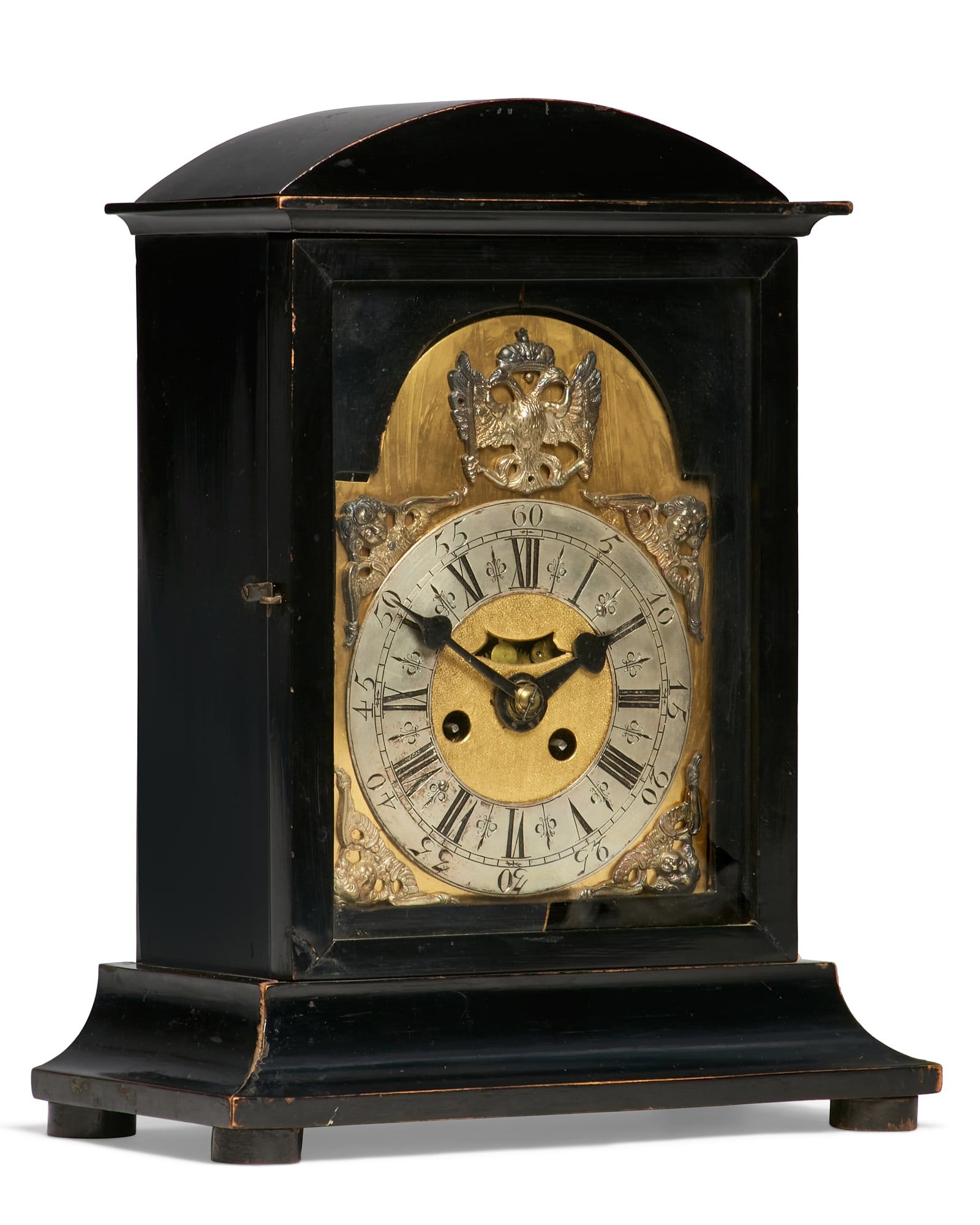 A CONTINENTAL EBONIZED MANTEL