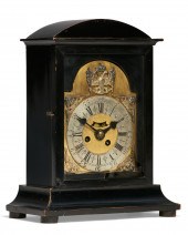 A CONTINENTAL EBONIZED MANTEL