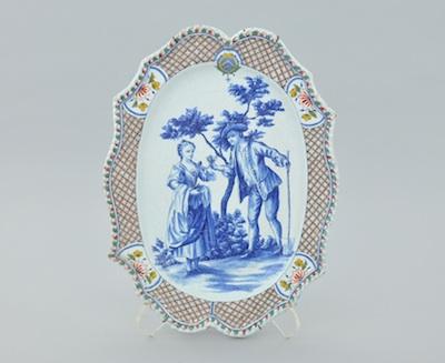 A Continental Faience Platter Of