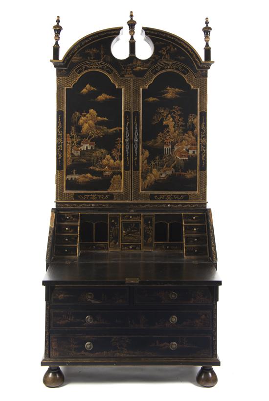 A Continental Gilt and Lacquered