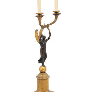 A Continental Gilt and Patinated