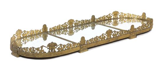*A Continental Gilt Bronze Mirrored