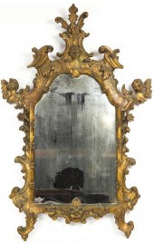 A CONTINENTAL GILTWOOD CARVED