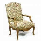 A CONTINENTAL GILTWOOD CARVED
