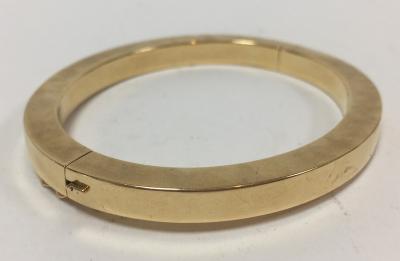 A Continental gold bangle of