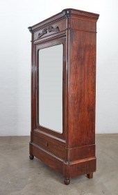 A CONTINENTAL HARDWOOD ARMOIRE