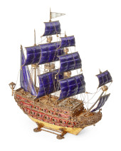 A CONTINENTAL JEWELED AND ENAM