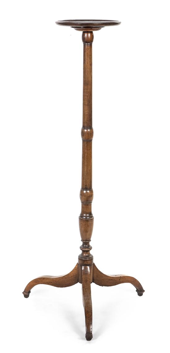 *A Continental Mahogany Candlestand
