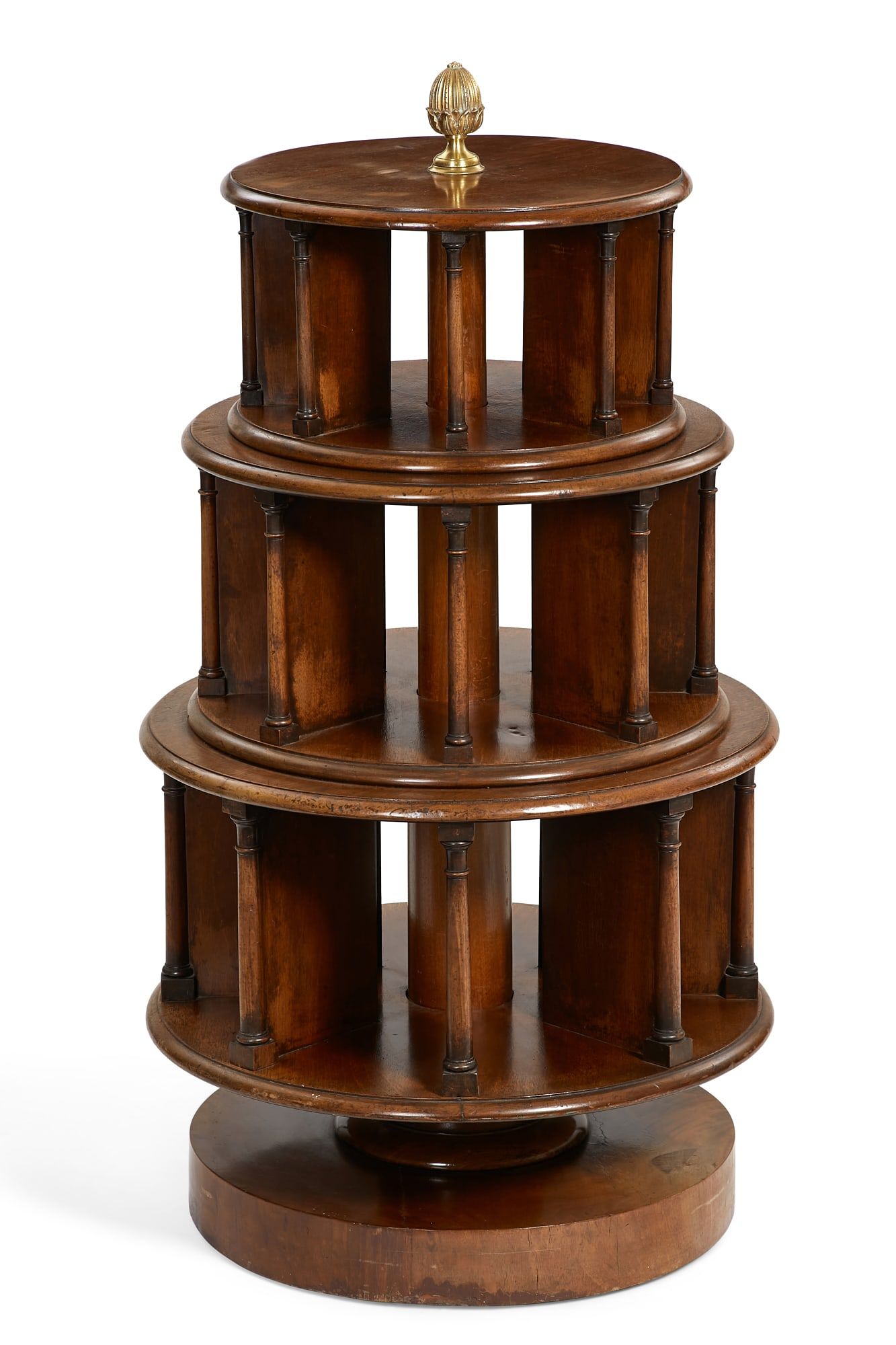 A CONTINENTAL MAHOGANY REVOLVING