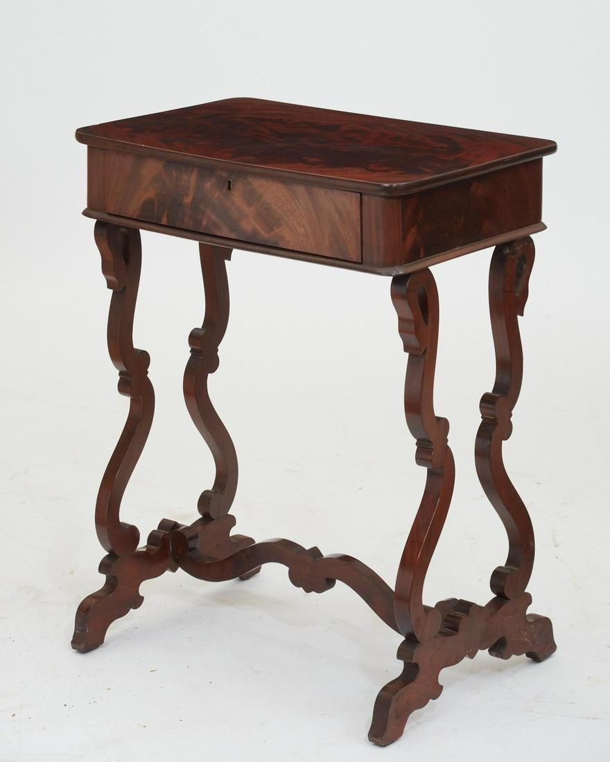 A CONTINENTAL MAHOGANY SIDE