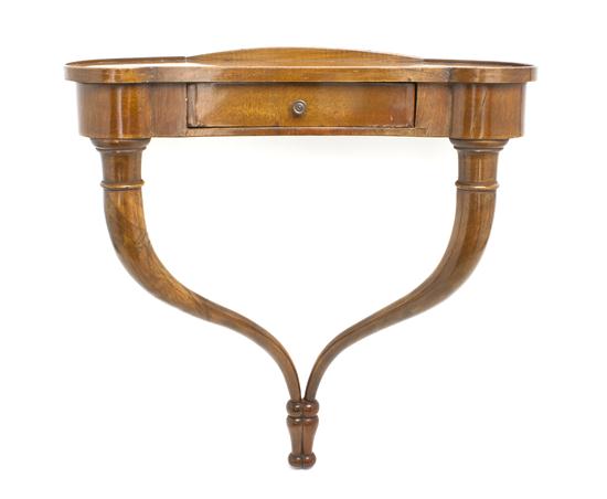 A Continental Mahogany Wall Shelf